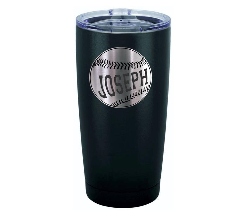 May include: Black stainless steel tumbler with a silver baseball design and the name "JOSEPH" engraved on it.