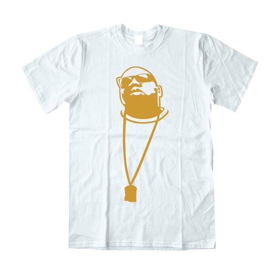 white and gold jordan shirt