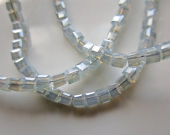 20mm x 19mm Chunky Diamond-shaped Wedge 12 Faceted Blue Glass Beads