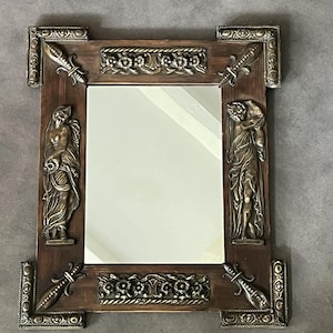 Antique french Mirror dating from the nineteenth century in brass on wood
