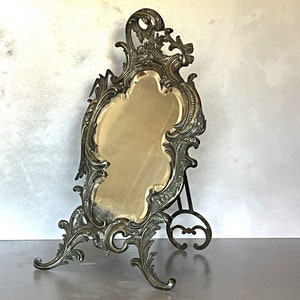 Rare and authentic bronze mirror of the nineteenth century.