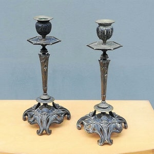 Pair of french antique bronze Art Nouveau candle holders