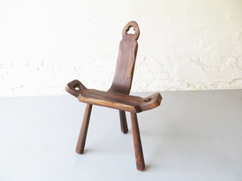 Tripod antique brutalist chair