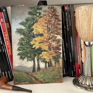 Pintura antigua sobre panel de madera.