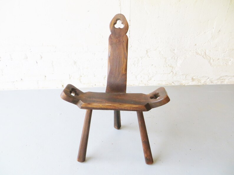 Tripod antique brutalist chair