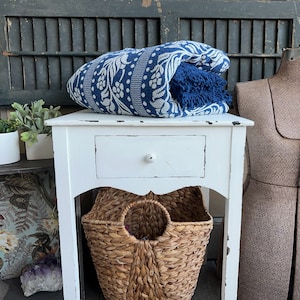 Vintage 1970s indigo and white reversible bedspread with fringe trim