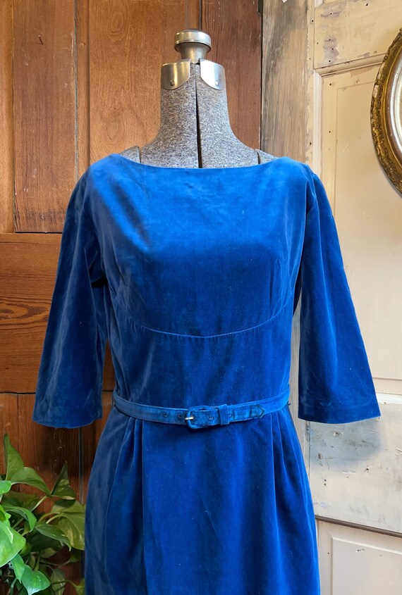 Vintage 1950s blue velvet belted wiggle dress. Vintage 1950s blue velvet belted wiggle dress.