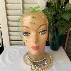 Vintage green birdcage fascinator, veil with dots and bows