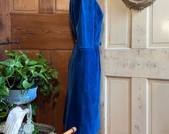 Vintage 1950s blue velvet belted wiggle dress.