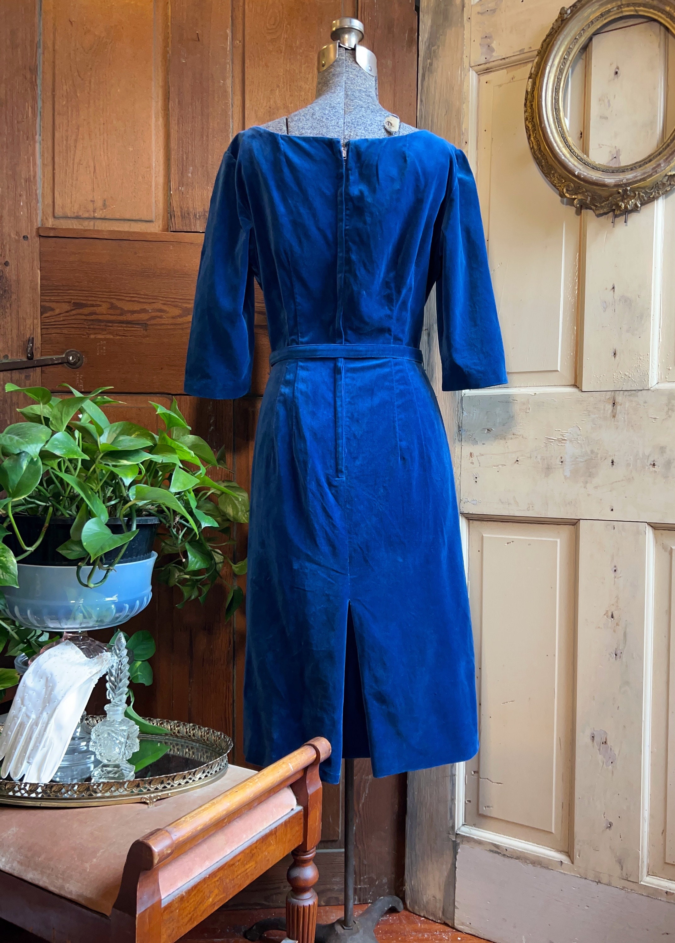 Vintage 1950s blue velvet belted wiggle dress.