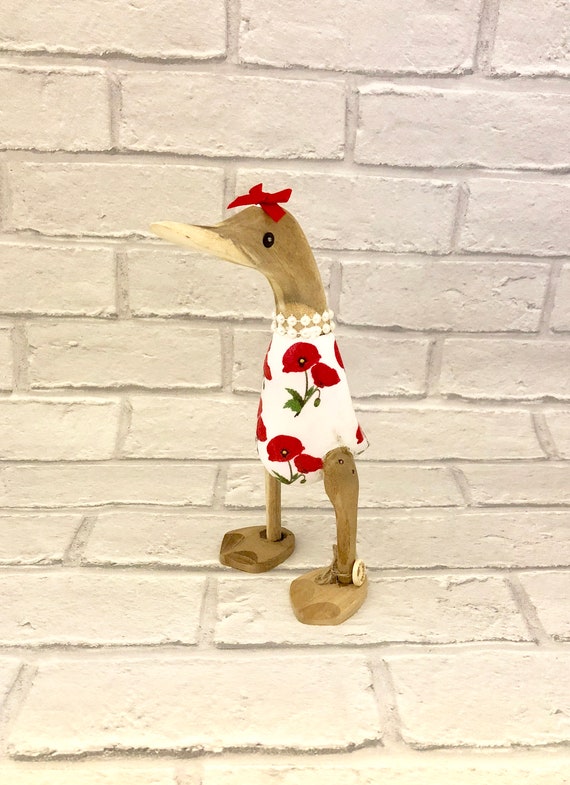 Hand carved wooden duck red poppy ornament