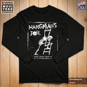 Pode incluir: Camiseta preta de manga comprida com um gráfico branco. O gráfico apresenta um esqueleto pendurado em uma forca, com o texto "HANGMAN'S JOKE" e "LAST LAUGH TOUR '94".