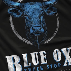 May include: A blue ox with horns, a white circle around it, and the text "Blue Ox Truck Stop" below.