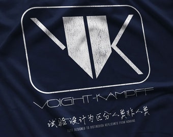 May include: A dark navy blue fabric featuring a white graphic print. The design includes a stylized VK logo inside a rounded rectangle, the text VOIGHT-KAMPFF, and Chinese characters with the English text TEST DESIGNED TO DISTINGUISH REPLICANTS FROM HUMANS.