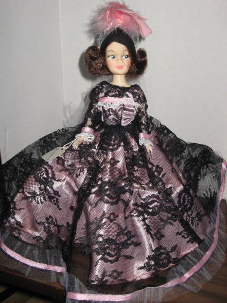 Glenna 11 inch fashion doll dressed in pink/black gown. image 0
