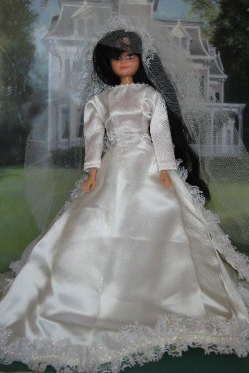 Fashion Doll Dressed in Satin Bride Gown stand included image 0