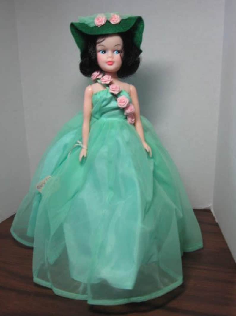 Miss Spring 11.5 inch fashion doll dressed in Green gown. image 0