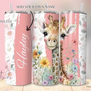 May include: A personalised tumbler with a giraffe design, flowers, and the name "Hayley". The tumbler has a pink and white floral background and a straw. The design is seamless.