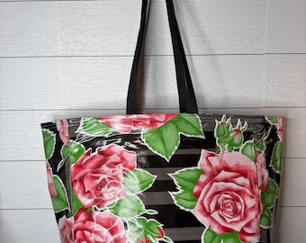 Black rose darling beach bag carry on waterproof reversible tote with pocket and key clasp. Stands on its own pool, catch all bag.