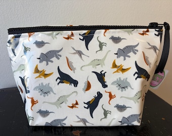 Dinosaur oilcloth and laminated cotton zip bag. Waterproof toiletry Pouch.  Pencil, snack zip bag. Easy Clean