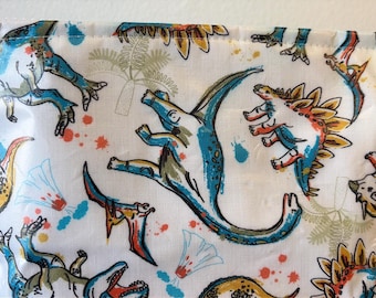 Dinosaur laminated cotton and oilcloth zip bag. Waterproof toiletry Pouch.  Waterproof zip bag.