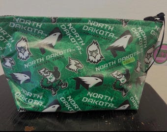 UND Fighting Hawks oilcloth and laminated cotton zippered Cosmetic pouch.  Waterproof pencil, snack and makeup zip bag.