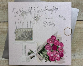 May include: A birthday card with the text "To a Beautiful Granddaughter on your Birthday." The card features a cake with candles, a bouquet of pink roses, and butterfly accents. The card is on a gray envelope.