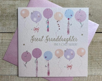 May include: A greeting card for a great granddaughter, featuring pastel balloons in pink, purple, and blue. The card reads "Great Granddaughter, Have a Lovely Birthday" in elegant script, with a matching pink envelope.