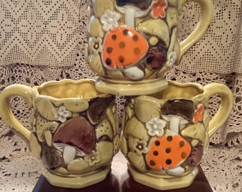 Three vintage Merry Mushroom mugs/cups