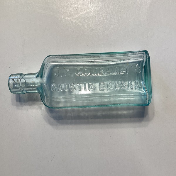Vintage medicine bottle, J.E. Combault’s Caustic Balsam bottle, vintage green glass embossed bottle, apothecary bottle, old medical bottle