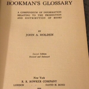 May include: The Bookman's Glossary: A Compendium of Information Relating to the Production and Distribution of Books by John A. Holden. Second Edition, Revised and Enlarged. New York: R. R. Bowker Company, London: David H. Bond, 1931.