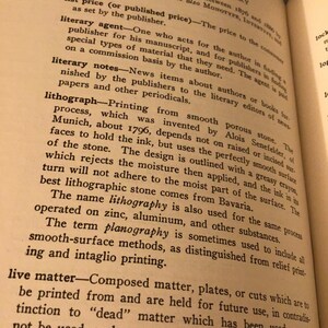 May include: A page from a book titled "The Bookman's Glossary" with text about the history of typography and the process of lithography. The text describes the process of lithography, which was invented by Alois Senefelder in Munich, Germany, around 1796.
