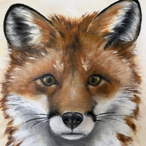 May include: A detailed oil painting of a fox face featuring vibrant orange and brown fur, white markings around the muzzle and chest, pointed ears with black tips, and expressive amber eyes. The brushstrokes create a textured appearance.