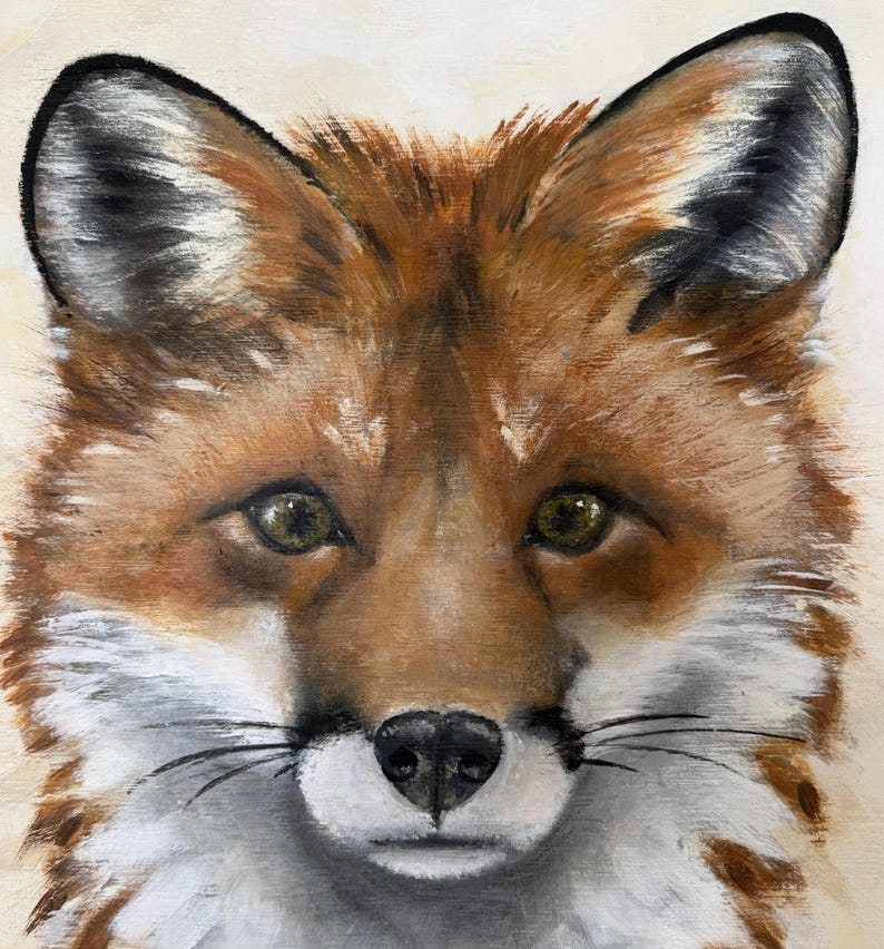 May include: A detailed oil painting of a fox face featuring vibrant orange and brown fur, white markings around the muzzle and chest, pointed ears with black tips, and expressive amber eyes. The brushstrokes create a textured appearance.