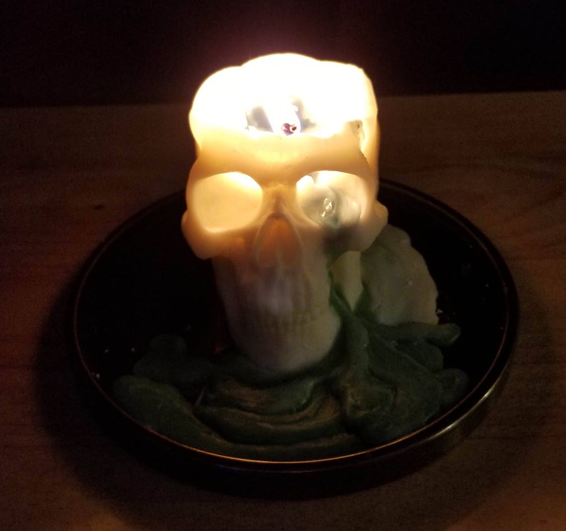 Bleeding skull candle Etsy