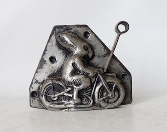 Brunnungmeyer Enschede Holland - Vintage midcentury Dutch chocolate mold. Rabbit on a motorcycle. Marked.
