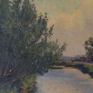 May include: A painting of a river scene with a large green tree on the left side of the image. The river is light blue and the sky is a pale yellow.