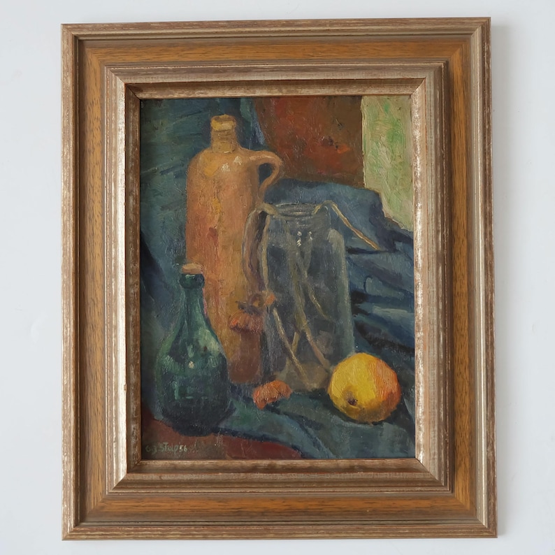 May include: A still life painting of a brown ceramic jug, a green glass bottle, a clear glass jar with twigs inside, and a yellow fruit on a blue cloth.