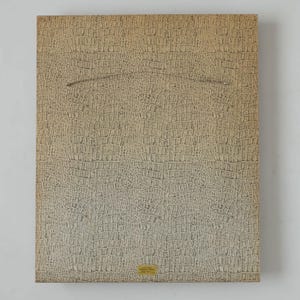 May include: A beige textured background with a crocodile skin pattern. A small white label with black text is in the bottom right corner.