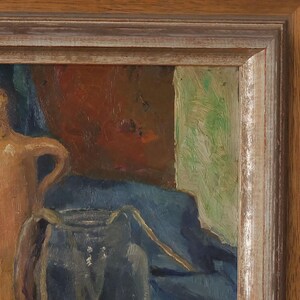 May include: A still life painting featuring a brown ceramic pitcher and a blue glass jar on a blue cloth. The background is a red and green abstract design.