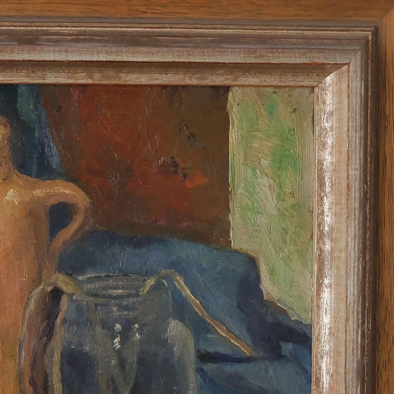 May include: A still life painting featuring a brown ceramic pitcher and a blue glass jar on a blue cloth. The background is a red and green abstract design.