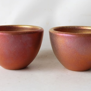 Mobach Utrecht Holland. 2 modern earthenware flower pots with a bronze colored luster glaze. Very decorative.