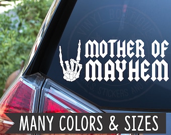 May include: White vinyl decal with a skeleton hand making the rock and roll sign and the text "Mother of Mayhem" in a gothic font.