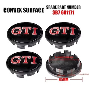 Puede incluir: Cuatro tapacubos negros con las letras rojas "GTI". Las tapas tienen una superficie convexa y se muestran con un n&uacute;mero de pieza de repuesto y medidas de 65 mm y 2,8 cm/1,10 pulgadas.