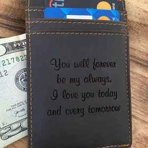 May include: A brown leather wallet with a card slot and an engraved message that reads "You will forever be my always, I love you today and every tomorrow".