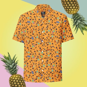 May include: Orange button-down shirt with a repeating pattern of colorful candy hearts, guitars, and flowers. The shirt has a classic collar and short sleeves. The background features pineapples and a gradient of yellow, pink, and green.