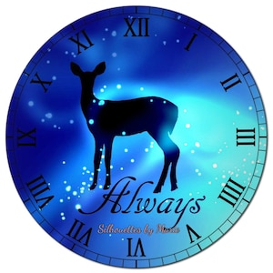May include: A blue and green clock face with Roman numerals and a silhouette of a deer. The words "Always" and "Silhouettes by Marie" are printed on the clock face.