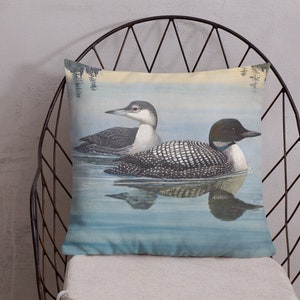 This beautiful pillow comes in two sizes, 18x18 or 22x22 inch and features a painting of an adult and immature common loon. The amazing state bird of Minnesota! The perfect addition to any living room or cabin!