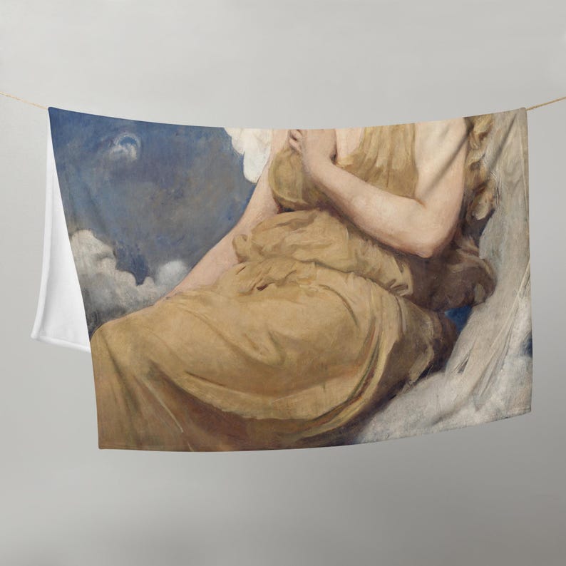May include: A throw blanket featuring a classical painting of a figure in a flowing golden gown. The artwork depicts a woman reclining amidst clouds, with a blue sky backdrop. The blanket has a white reverse side.