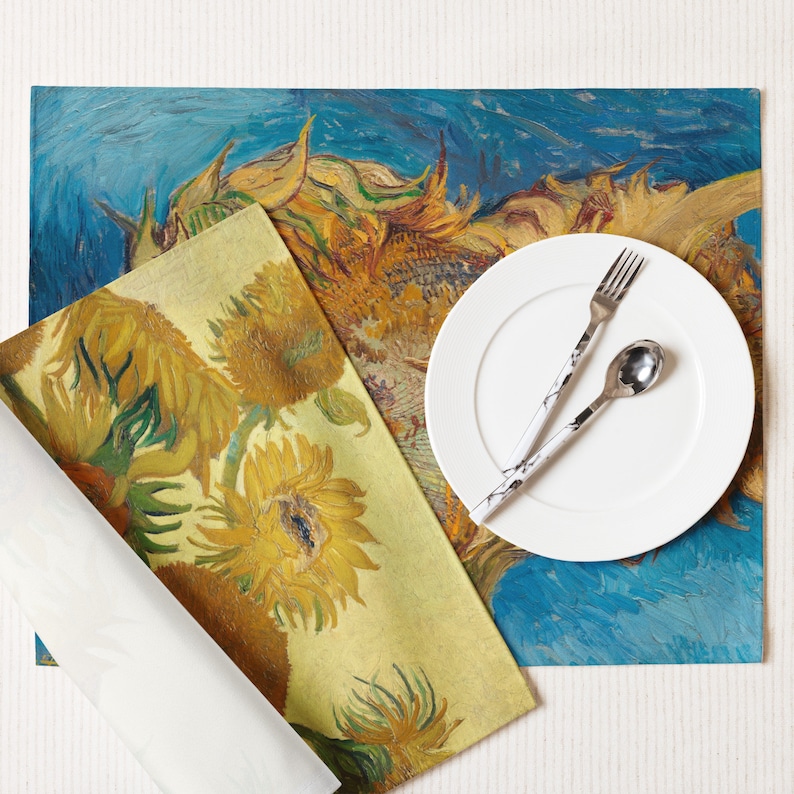 This stunning set of 4 placemats feature the infamous Sunflower paintings by Vincent Van Gogh. The most famous mostly yellow painting, and two with blue backgrounds. The contrasting yellows and blues will brighten up any table!